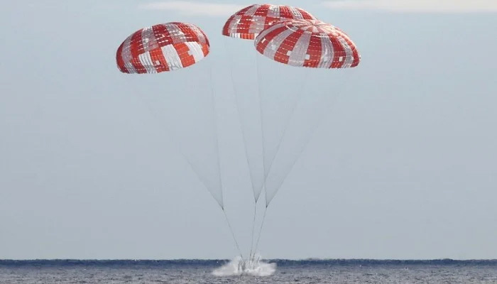 NASA capsule Orion splashes down after record-setting lunar voyage
